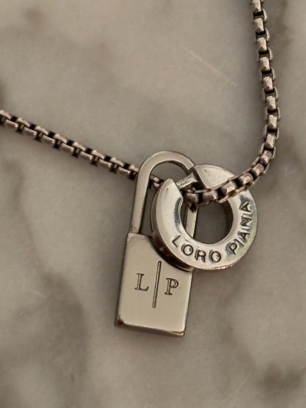 LORO PIANA Circle & Lock Pendant Silver Tone